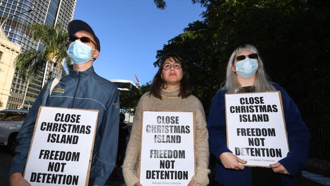 BRISBANE, AUSTRALIA, AUGUST 18, 2020 - Protesters hold signs during a rally before marching through central Brisbane to oppose the expansion/reopening of the Christmas Island detention centre and to call for all refugees and asylum seekers to be released into the community. (NCA NewWire/Dan Peled)