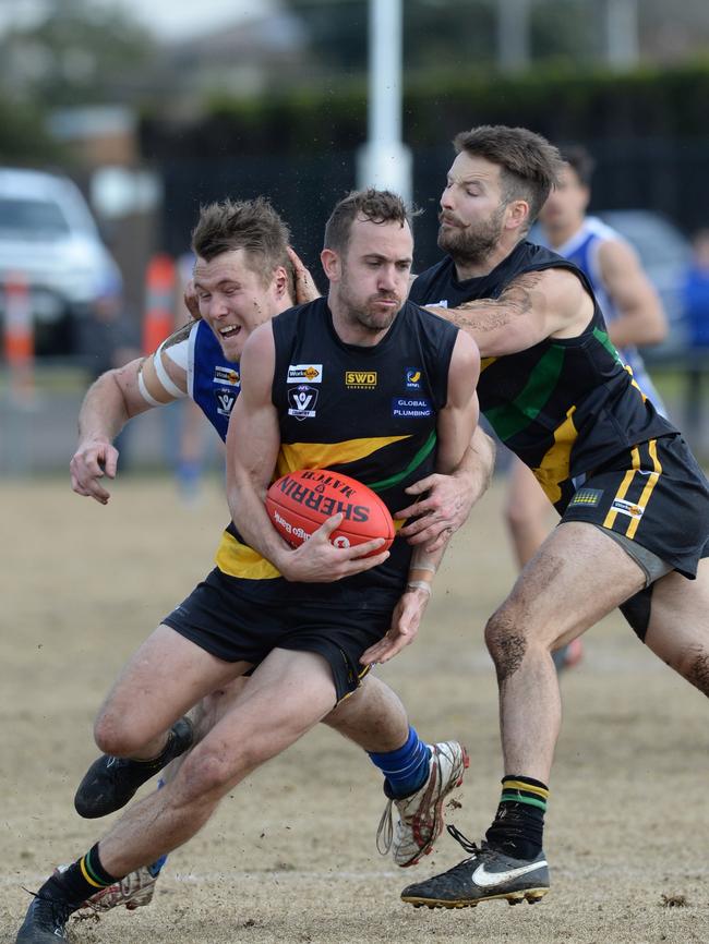 Beau Cosson gets another possession for Dromana. Picture: Chris Eastman