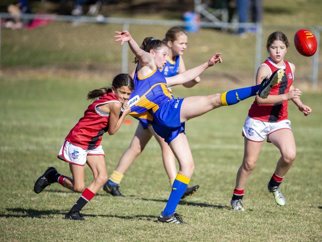 Harriet Gow is tackled by Nakita Irvine in the AFL game between Everton Wolves and Victoria Point Sharks, Sunday, June 23, 2019 (AAP Image/Richard Walker)