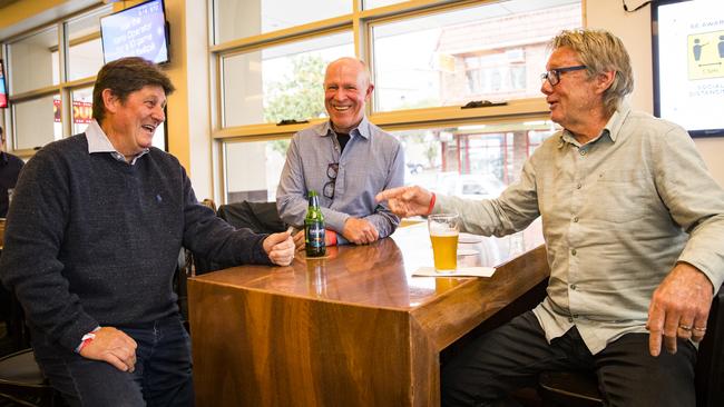 Garry Carden (left) with mates Garry Hughes and Phil Young at the Croydon Park Hotel for Carden’s farewell drinks. Picture: Dylan Robinson