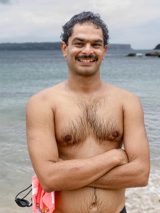 Regular ocean swimmer Kiran Aithala took to the water. Picture: Max Mason-Hubers