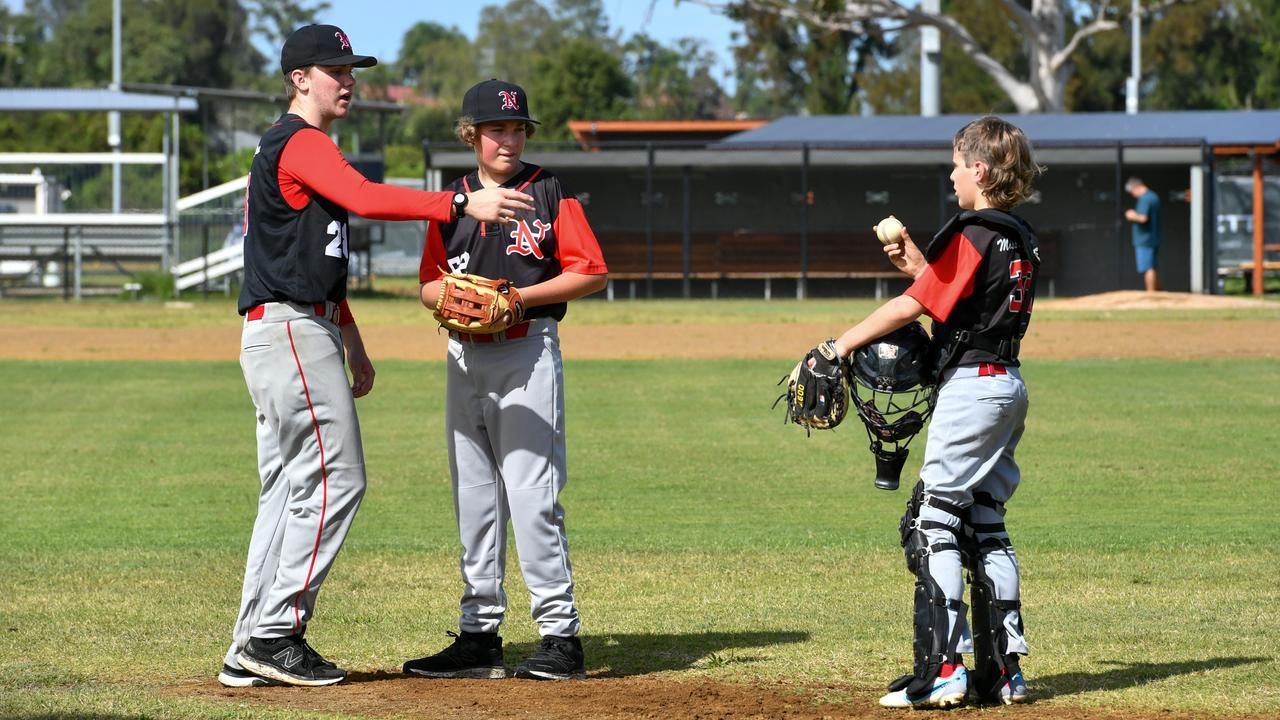 North's Baseball Club discuss strategy against Worker's Baseball Club in a friendly opener for the season at Albert Park in Lismore. Picture: Cath Piltz