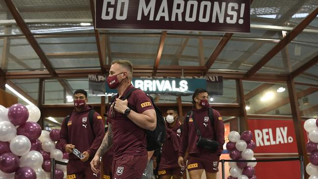 The Maroons arrive at Townsville airport on Monday. Picture: Getty Images