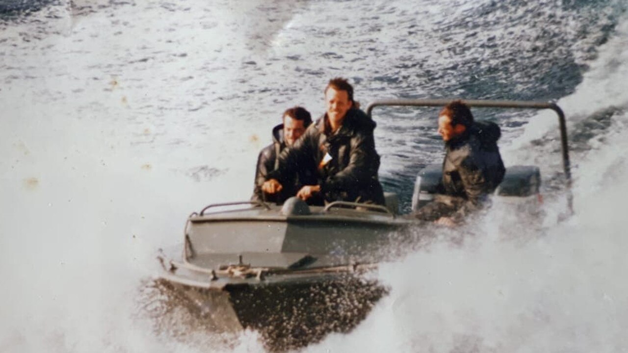 Black Market Espresso Bar owner David Rodrigues, left, on a boat during his stint working for special forces in Africa. Picture: Supplied.