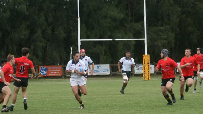 Oskar Enasio on the burst. The teenager is playing both rugby and league.