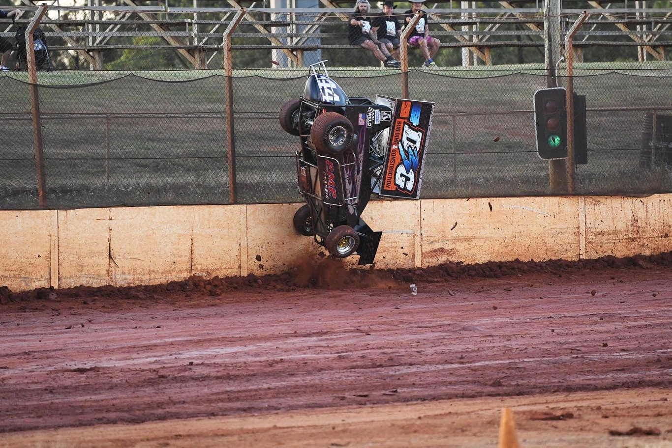 Maryborough Speedway Round One - Ken Newton climbs the wall after losing control on the slippery track. Picture: Cody Fox