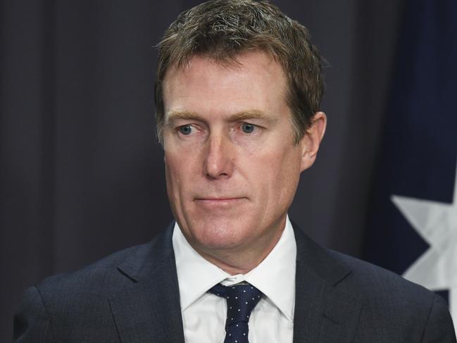 Australian Attorney-General Christian Porter speaks to the media during a press conference at Parliament House in Canberra, Wednesday, May 9, 2018. The Turnbull government is calling for the resignations of four MPs after the High Court disqualified Labor senator Katy Gallagher over her dual citizenship. Attorney-General Christian Porter says therefore it's time for Labor MPs Susan Lamb, Justine Keay and Josh Wilson, as well as independent Rebekha Sharkie to stand down, given their British ancestry. (AAP Image/Lukas Coch) NO ARCHIVING