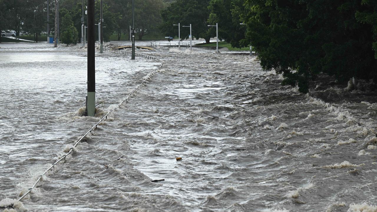 1/122024: Flash flooding in Thompson Estate reserve and on the corner of Juliette St and Earle St, rapidly flooded, in Stones Corner, Brisbane. pic: Lyndon Mechielsen/Courier Mail