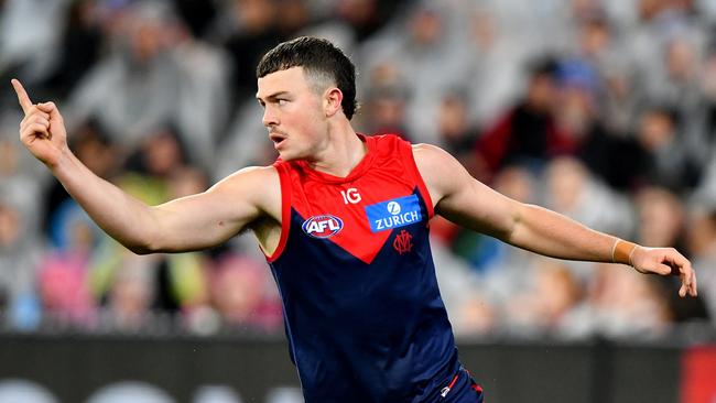 MELBOURNE, AUSTRALIA - JULY 13: Daniel Turner of the Demons celebrates kicking a goal during the round 18 AFL match between Melbourne Demons and Essendon Bombers at Melbourne Cricket Ground, on July 13, 2024, in Melbourne, Australia. (Photo by Josh Chadwick/AFL Photos/via Getty Images)