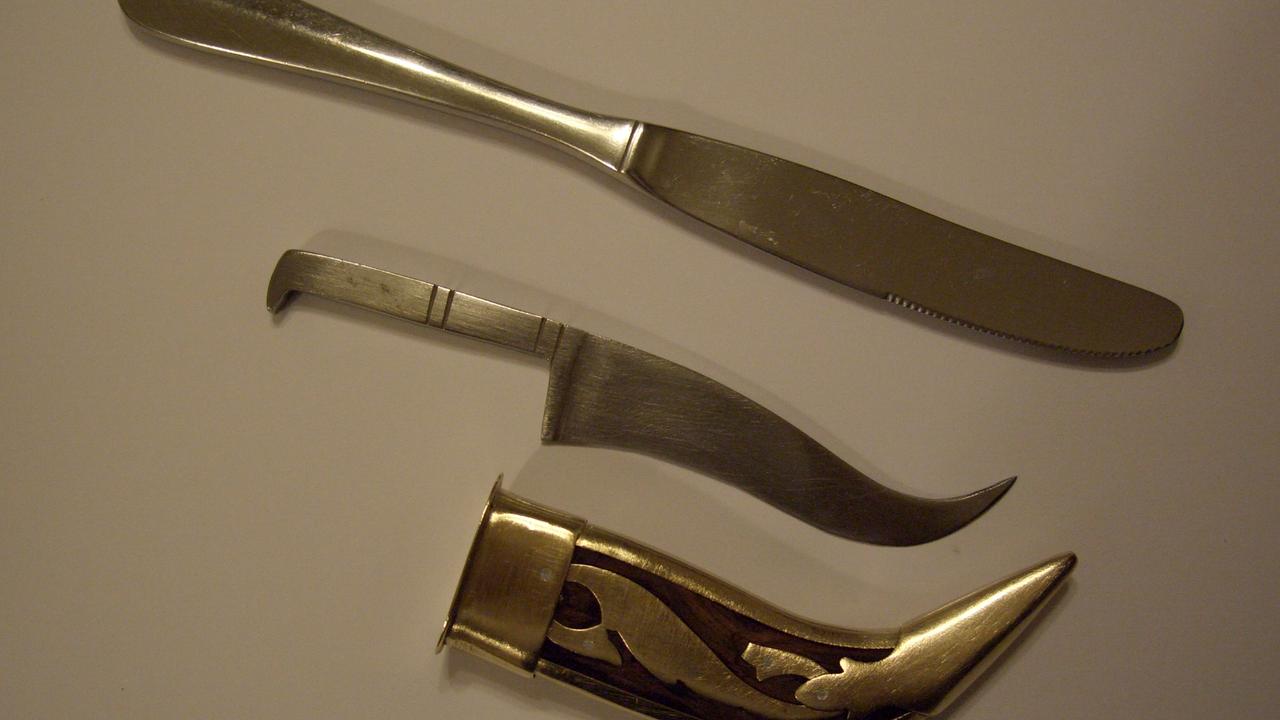 Generic pic of a kirpan and a butter knife worn by the Sikh community.