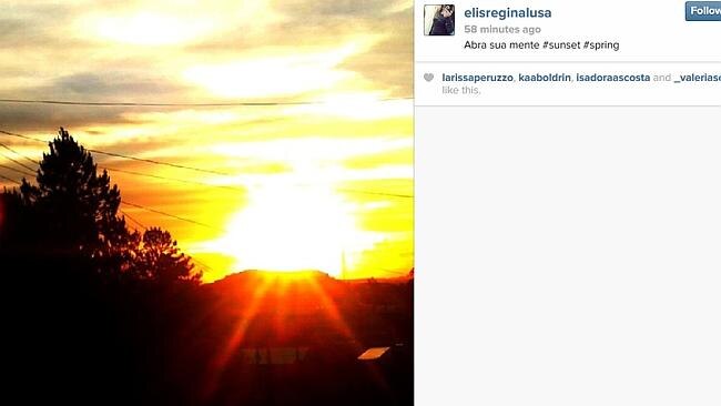 #SPRING: A blazing sun sets behind power lines. Classic Instagram.