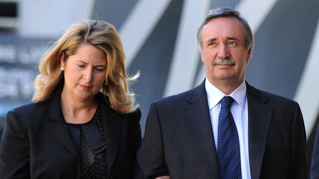 Businessman Ken Talbot (right) leaves the Magistrates court in Brisbane in 2008. Picture: AAP Image/Dave Hunt