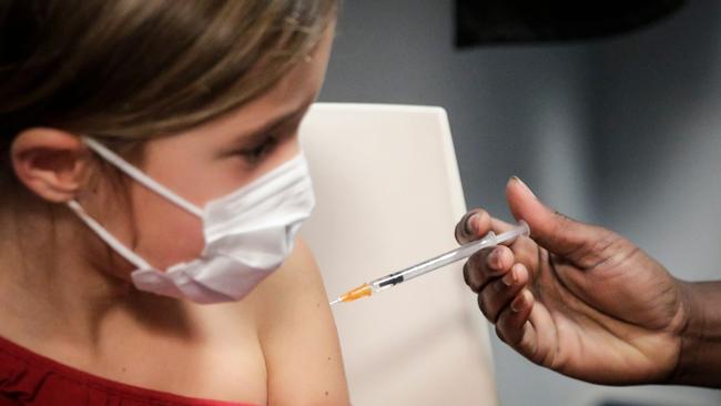 Children aged between five and 11 are being vaccinated overseas following approval from international authorities. Picture: AFP