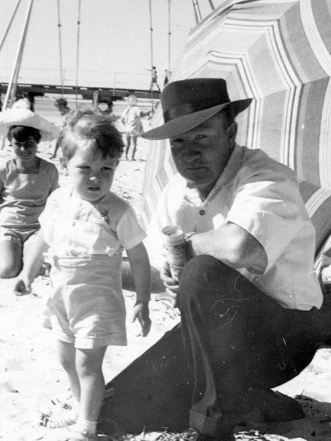 Sir Lynton as a child with father Keith at Moonta Bay in 1958.