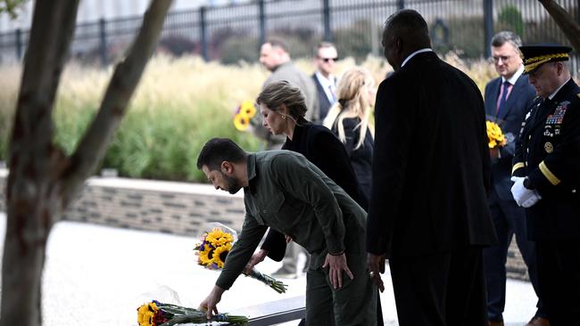 Volodymyr Zelensky and first lady Olena Zelenska lay wreaths at the 9/11 Pentagon Memorial, in Washington. Picture: AFP