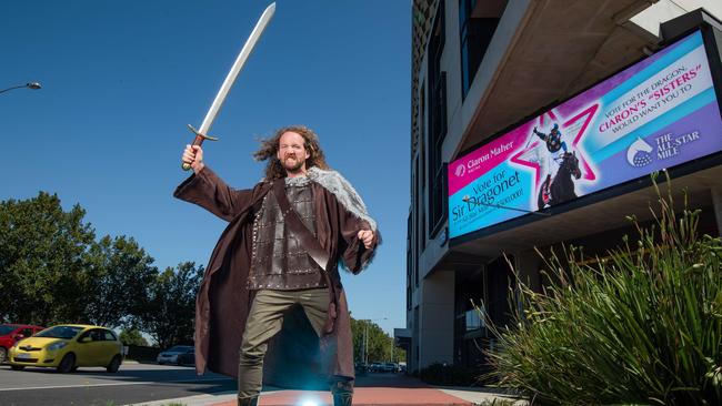 Trainer Ciaron Maher gets into character on Dandenong Rd in an effort to put Sir Dragonet’s name on the map before voting closes for the 2021 All-Star Mile. Picture: Jason Edwards