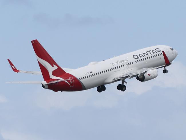 SYDNEY, AUSTRALIA - NewsWire Photos MARCH 10, 2021: A Qantas plane pictured taking off at Sydney Airport.Picture: NCA NewsWire / Damian Shaw