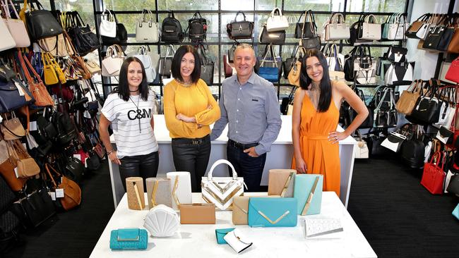 Colette Hayman with her husband Mark and daughters (L) Bianca and (R) Natasha at the Colette by Colette Hayman HQ. Picture: Troy Snook.