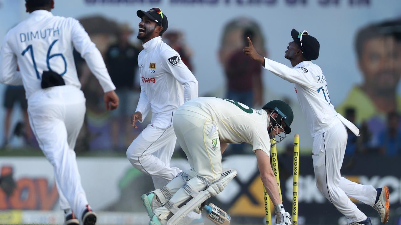 Sri Lankan players celebrate the dismissal of Steve Smith. Photo by Buddhika Weerasinghe/Getty Images