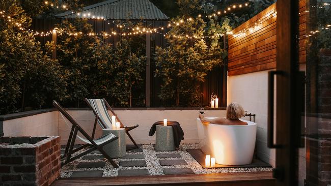 Braithwaite’s outdoor bath in the garden courtyard is a great spot for some night-time bathing. Picture: Renee Thurston