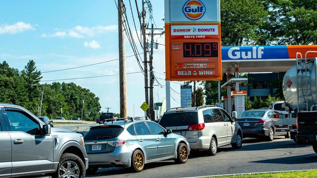 Drivers line up in their cars outside a Gulf gas station, which is selling regular gas at $4.09 a gallon, in Lynnfield, Massachusetts. Picture: AFP