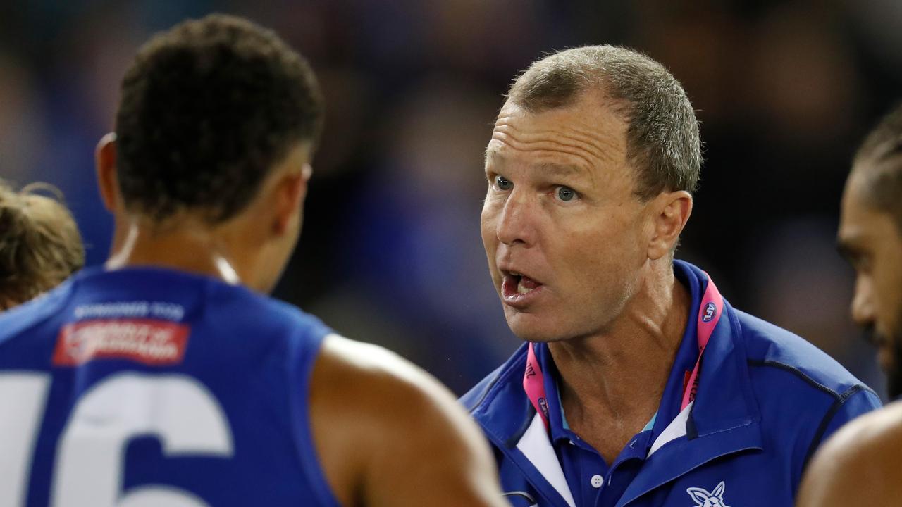 MELBOURNE, AUSTRALIA - APRIL 11: John Blakey, Assistant Coach of the Kangaroos addresses his players during the 2021 AFL Round 04 match between the North Melbourne Kangaroos and the Adelaide Crows at Marvel Stadium on April 11, 2021 in Melbourne, Australia. (Photo by Michael Willson/AFL Photos via Getty Images)