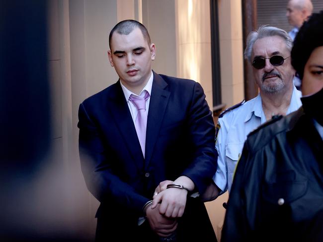 Mathew Flame is taken into a police van at the Supreme Court in Sydney. Picture: NCA NewsWire / Dylan Coker