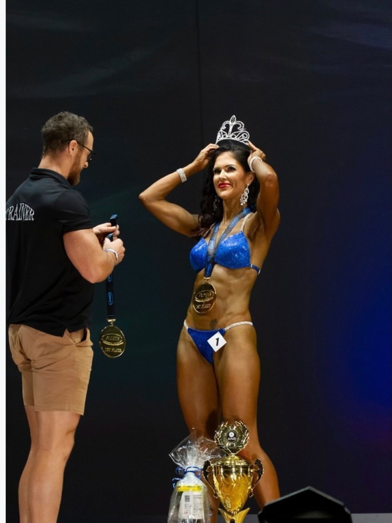 Paula Mandl took home 1st place in the Bikini Model 45+ age category and overall Bikini Competitor across all age groups sporting a custom-made Wonder Woman bikini at the Australian Natural Bodybuilding Queensland State Titles 2020. Picture: Gary Harvey.