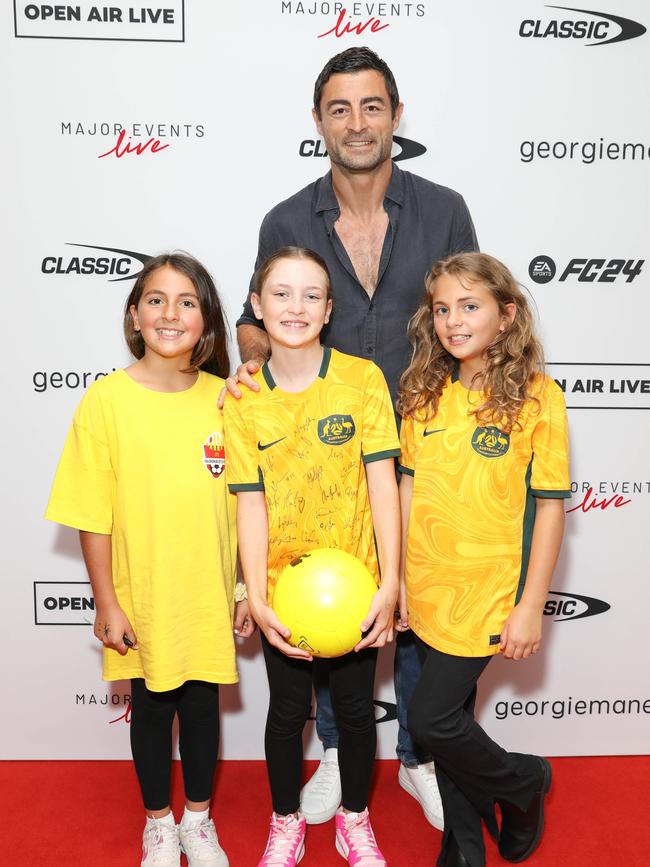 Anthony Minichiello with his daughter and young fans. Picture: Christopher Khoury / Australian Press Agency