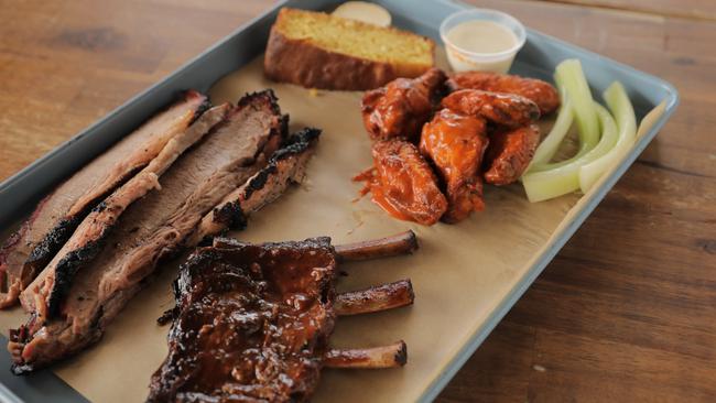 Brisket, ribs, buffalo wings and corn bread at Proof. Picture: Mark Cranitch