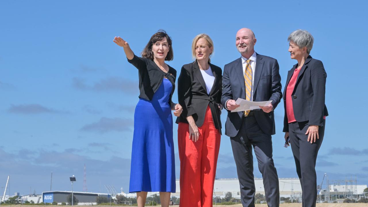 Deputy Premier Susan Close MP, federal Finance Minister Katy Gallagher, Australian Naval Infrastructure CEO Andrew Seaton and Foreign Affairs Minister Penny Wong at Snapper Point on the Port River, where the new AUKUS shipyard will be built. Picture: NCA NewsWire / Brenton Edwards