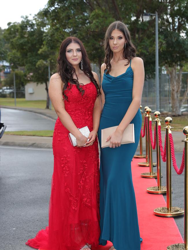 Pacific Pines High formal, at the school. Ella Harris & Aranda Paric Picture Glenn Hampson