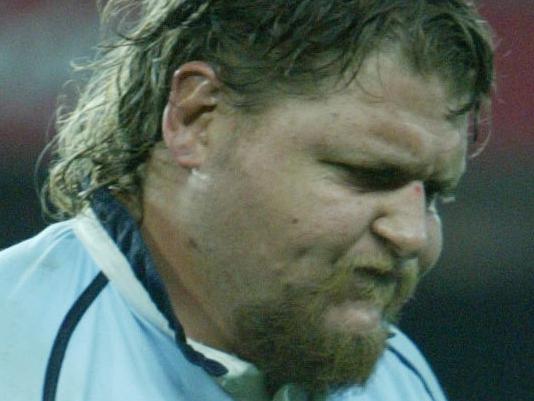 NSW Waratahs v Otago Highlanders - Matt Dunning hits a bottle of water against his leg as he leaves the field.