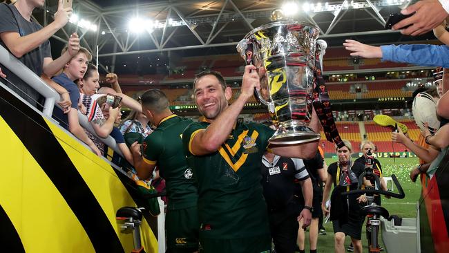 Cameron Smith holds aloft the Rugby League World Cup Trophy after the 2017 Rugby League World Cup Final. Picture: Getty Images.