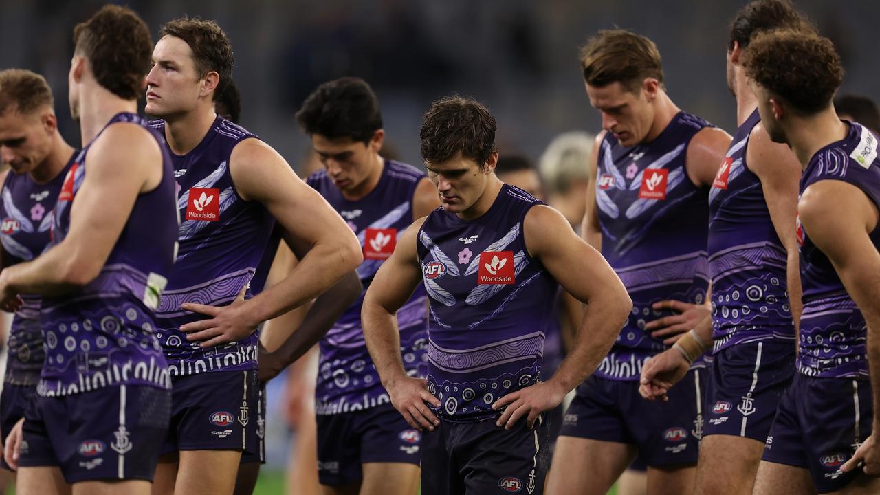The Dockers look dejected after the loss to Collingwood. Picture: Paul Kane