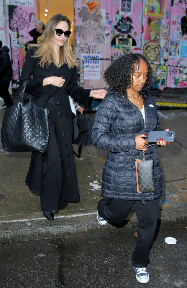 Angelina Jolie and Zahara Jolie-Pitt leave her store Atelier Jolie in New York City on December 27. Picture: Christopher Peterson/SplashNews.com