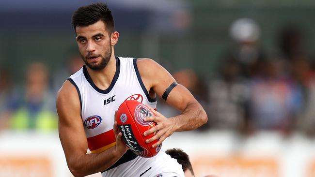 Wayne Milera of the Crows looks for options in Alice Springs. Picture: Michael Willson/AFL Media/Getty Images