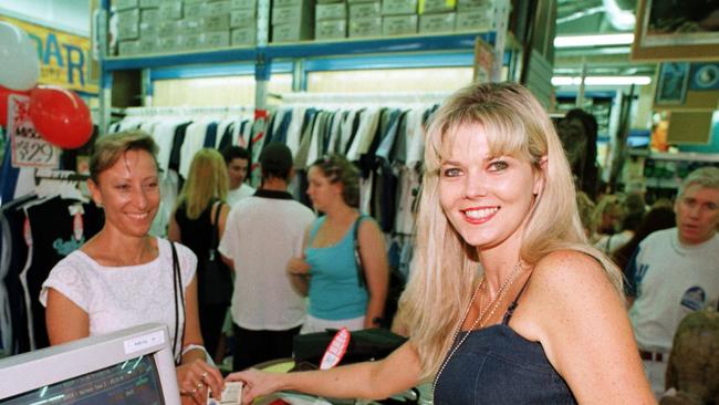 Vicki Chalaley helps out at Harbour Town’s City Beach shop on its opening day.