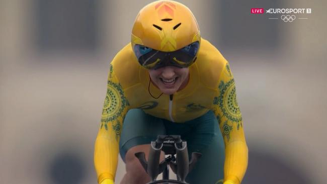 Grace Brown from Australia crosses the line winning the cycling individual time trial at the 2024 paris Olympic games.