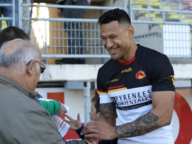 Israel Folau meets supporters after training with Catalan Dragons in Perpignan, France. Picture: Ella Pellegrini