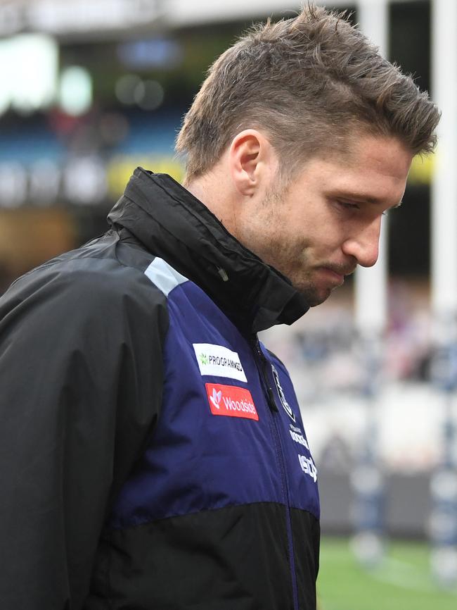 A dejected Hogan leaves the ground after the Dockers’ clash with Melbourne. Picture: AAP