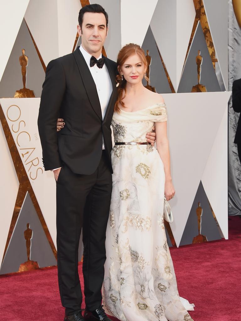 Actors Sacha Baron Cohen (L) and Isla Fisher attend the 88th Annual Academy Awards. (Photo by Jason Merritt/Getty Images)