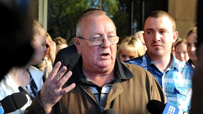 Keith Woodford speaks outside the Supreme Court flanked by his daughter Alison and son Gary after Dudley Davey’s sentencing.