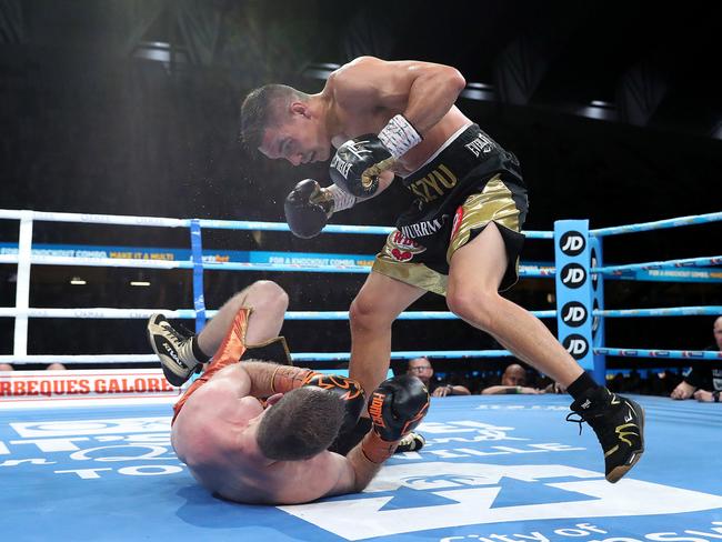 Tim Tszyu puts Jeff Horn down. Picture: Peter Wallis