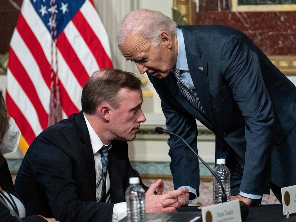 Joe Biden confers with his National Security Adviser Jake Sullivan. Picture: Getty Images via AFP