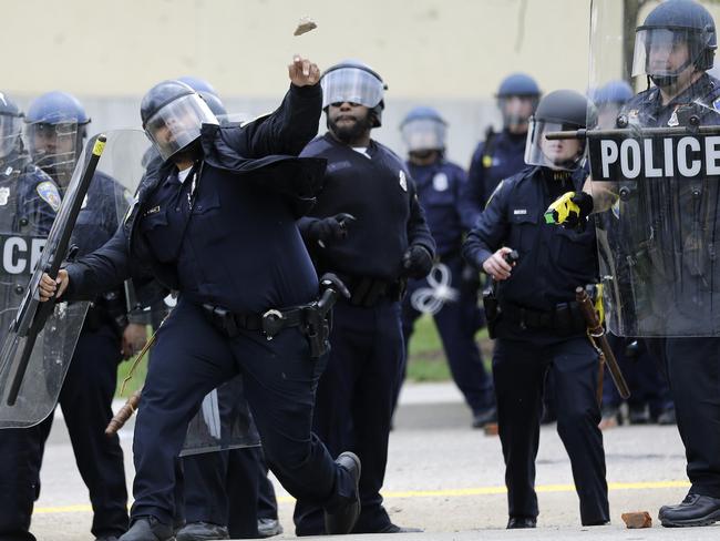 Baltimore riots: Freddie Gray death sees tensions flare, officers ...