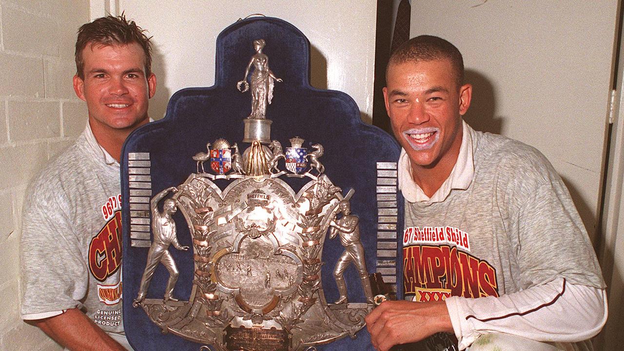 Matthew Mott and Andrew Symonds with the Sheffield Shield trophy in 1997.
