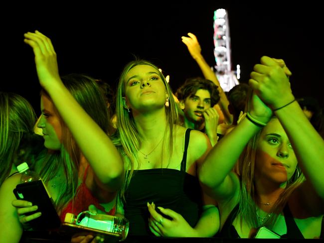 Revellers dance on New Year’s Eve in Glenelg, Adelaide. Picture: Tracey Nearmy/Adelaide Advertiser