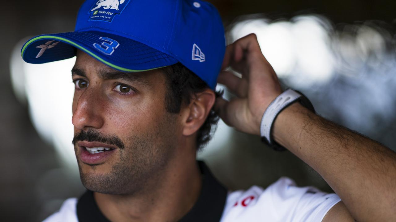 SPA, BELGIUM - JULY 25: Daniel Ricciardo of Australia and Visa Cash App RB talks to the media in the Paddock during previews ahead of the F1 Grand Prix of Belgium at Circuit de Spa-Francorchamps on July 25, 2024 in Spa, Belgium. (Photo by Rudy Carezzevoli/Getty Images)