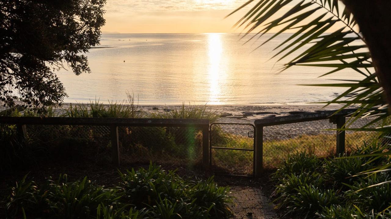 A gate leads directly to the beach.